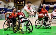 22 January 2022; Jack Mangan of Rebel Wheelers in action against John Fulham of Killester during the InsureMyHouse.ie IWA Cup final match between Killester BC, Dublin, and Rebel Wheelers, Cork, at National Basketball Arena in Tallaght, Dublin. Photo by Brendan Moran/Sportsfile