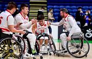 22 January 2022; Conor Coughlan of Rebel Wheelers celebrates with teammates after being named MVP of the InsureMyHouse.ie IWA Cup final match between Killester BC, Dublin, and Rebel Wheelers, Cork, at National Basketball Arena in Tallaght, Dublin. Photo by Brendan Moran/Sportsfile