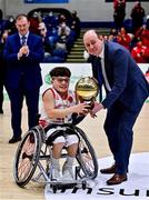 22 January 2022; Conor Coughlan of Rebel Wheelers is presented with the MVP by Basketball Ireland president PJ Reidy after the InsureMyHouse.ie IWA Cup final match between Killester BC, Dublin, and Rebel Wheelers, Cork, at National Basketball Arena in Tallaght, Dublin. Photo by Brendan Moran/Sportsfile