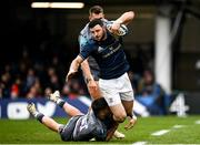 22 January 2022; Robbie Henshaw of Leinster is tackled by Cameron Redpath of Bath during the Heineken Champions Cup Pool A match between Bath and Leinster at The Recreation Ground in Bath, England. Photo by Harry Murphy/Sportsfile