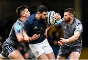 22 January 2022; Robbie Henshaw of Leinster is tackled by Cameron Redpath, left, and Gabriel Hamer-Webb of Bath during the Heineken Champions Cup Pool A match between Bath and Leinster at The Recreation Ground in Bath, England. Photo by Harry Murphy/Sportsfile