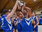 22 January 2022; UCC Demons captain Carleton Cuff celebrates with the cup after  the InsureMyHouse.ie Presidents' National Cup Final match between UCC Demons, Cork, and Drogheda Wolves, Louth, at National Basketball Arena in Tallaght, Dublin. Photo by Brendan Moran/Sportsfile