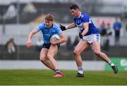 22 January 2022; Cameron McCormack of Dublin in action against James Finn of Laois during the O'Byrne Cup Final match between Dublin and Laois at Netwatch Cullen Park in Carlow. Photo by Daire Brennan/Sportsfile
