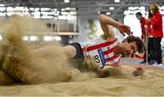 22 January 2022; Shane Aston of Trim AC, Meath, competing in the long jump event of the senior men's heptathlon  during the Irish Life Health Indoor Combined Events All Ages at TUS in Athlone, Westmeath. Photo by Sam Barnes/Sportsfile