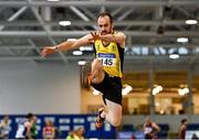 22 January 2022; Martin Mooney of Inishowen AC, Donegal, competing in the long jump event of the masters 35-49 men's pentathlon during the Irish Life Health Indoor Combined Events All Ages at TUS in Athlone, Westmeath. Photo by Sam Barnes/Sportsfile