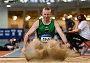 22 January 2022; David Stewart of Derry Track Club, Derry, competing in the long jump event of the masters 50-59 men's pentathlon during the Irish Life Health Indoor Combined Events All Ages at TUS in Athlone, Westmeath. Photo by Sam Barnes/Sportsfile