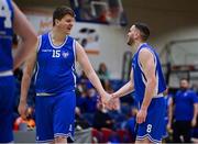 22 January 2022; Conor Ryan, left, and Kyle Hosford of UCC Demons during the InsureMyHouse.ie Presidents' National Cup Final match between UCC Demons, Cork, and Drogheda Wolves, Louth, at National Basketball Arena in Tallaght, Dublin. Photo by Brendan Moran/Sportsfile