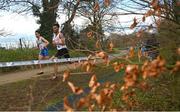 22 January 2022; Zak Mahamed of England, 18, and Quazzola Italo of Italy compete in the Senior Men's race during the Northern Ireland International Cross Country at Billy Neill MBE Country Park in Belfast. Photo by Ramsey Cardy/Sportsfile