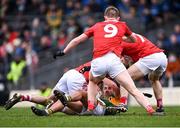 22 January 2022; Micheál Burns of Kerry in action against Cork players, from left, Kieran Histon, Joe Grimes, and Matthew Taylor during the McGrath Cup Final match between Kerry and Cork at Fitzgerald Stadium in Killarney, Kerry. Photo by Piaras Ó Mídheach/Sportsfile