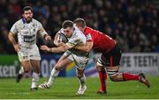22 January 2022; JJ Hanrahan of ASM Clermont Auvergne is tackled by Marcus Rea of Ulster during the Heineken Champions Cup Pool A match between Ulster and Clermont Auvergne at Kingspan Stadium in Belfast. Photo by Ramsey Cardy/Sportsfile
