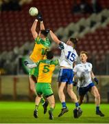 22 January 2022; Jason McGee of Donegal in action against Andrew Woods of Monaghan during the Dr McKenna Cup Final match between Donegal and Monaghan at O'Neill's Healy Park in Omagh, Tyrone. Photo by Oliver McVeigh/Sportsfile