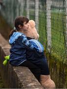 22 January 2022; Dublin supporter Róisn McCarthy, aged 7, from Tallaght, Co Dublin, with her teddy Chadwick, during the O'Byrne Cup Final match between Dublin and Laois at Netwatch Cullen Park in Carlow. Photo by Daire Brennan/Sportsfile