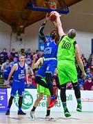 22 January 2022; Richaud Gittens of Coughlan C&S Neptune has a shot blocked by Kieran Donaghy of Garvey's Tralee Warriors during the InsureMyHouse.ie Pat Duffy Men’s National Cup Final match between C&S Neptune, Cork, and Garvey's Warriors Tralee, Kerry, at National Basketball Arena in Tallaght, Dublin. Photo by Brendan Moran/Sportsfile