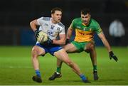 22 January 2022; Niall Kearns of Monaghan in action against Caolan McGonigle of Donegal during the Dr McKenna Cup Final match between Donegal and Monaghan at O'Neill's Healy Park in Omagh, Tyrone. Photo by Oliver McVeigh/Sportsfile