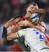 22 January 2022; Cheik Tiberghien of ASM Clermont Auvergne is tackled by Marcus Rea of Ulster during the Heineken Champions Cup Pool A match between Ulster and Clermont Auvergne at Kingspan Stadium in Belfast. Photo by Ramsey Cardy/Sportsfile