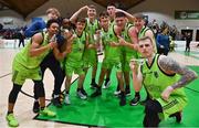 22 January 2022; Garvey's Warriors Tralee players celebrate with the cup after the InsureMyHouse.ie Pat Duffy Men’s National Cup Final match between C&S Neptune, Cork, and Garvey's Warriors Tralee, Kerry, at National Basketball Arena in Tallaght, Dublin. Photo by Brendan Moran/Sportsfile
