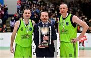22 January 2022; Garvey's Tralee Warriors captain Fergal O'Sullivan, left, and Kieran Donaghy of Garvey's Tralee Warriors are presented with the Pat Duffy cup by Basketball Ireland MNCC member Paul Barrett after the InsureMyHouse.ie Pat Duffy Men’s National Cup Final match between C&S Neptune, Cork, and Garvey's Warriors Tralee, Kerry, at National Basketball Arena in Tallaght, Dublin. Photo by Brendan Moran/Sportsfile