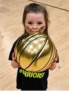 22 January 2022; Indie Donaghy, daughter of Kieran Donaghy of Garvey's Tralee Warriors, celebrates with the MVP award after the InsureMyHouse.ie Pat Duffy Men’s National Cup Final match between C&S Neptune, Cork, and Garvey's Warriors Tralee, Kerry, at National Basketball Arena in Tallaght, Dublin. Photo by Brendan Moran/Sportsfile