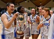 23 January 2022; Waterford Wildcats players celebrate with the cup after the InsureMyHouse.ie U20 Women's National Cup Final match between Portlaoise Panthers, Laois, and Waterford Wildcats, Waterford, at National Basketball Arena in Tallaght, Dublin. Photo by Brendan Moran/Sportsfile