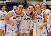 23 January 2022; Waterford Wildcats players, from left, Kate Hickey, Anna Grogan and Ciara Butler celebrate after the InsureMyHouse.ie U20 Women's National Cup Final match between Portlaoise Panthers, Laois, and Waterford Wildcats, Waterford, at National Basketball Arena in Tallaght, Dublin. Photo by Brendan Moran/Sportsfile