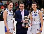 23 January 2022; Waterford Wildcats co-captains Anna Grogan, left, and Kate Hickey are presented with the cup by Basketball Ireland NABC chairman Jason Thornton after the InsureMyHouse.ie U20 Women's National Cup Final match between Portlaoise Panthers, Laois, and Waterford Wildcats, Waterford, at National Basketball Arena in Tallaght, Dublin. Photo by Brendan Moran/Sportsfile