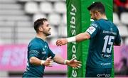 23 January 2022; Caolin Blade of Connacht, left, celebrates with teammate Tiernan O’Halloran after scoring their side's second try, which was subsequently disallowed, during the Heineken Champions Cup Pool A match between Stade Francais Paris and Connacht at Stade Jean Bouin in Paris, France. Photo by Seb Daly/Sportsfile
