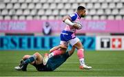 23 January 2022; Ngani Laumape of Stade Francais Paris evades the tackle of Connacht's Tom Farrell during the Heineken Champions Cup Pool A match between Stade Francais Paris and Connacht at Stade Jean Bouin in Paris, France. Photo by Seb Daly/Sportsfile