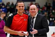 23 January 2022; Referee Maciej Nazimek is presented with their medal by Basketball Ireland president PJ reidy after the InsureMyHouse.ie U20 Women's National Cup Final match between Portlaoise Panthers, Laois, and Waterford Wildcats, Waterford, at National Basketball Arena in Tallaght, Dublin. Photo by Brendan Moran/Sportsfile