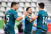 23 January 2022; Caolin Blade of Connacht, centre, celebrates with teammates Tiernan O’Halloran, left, and Alex Wootton after scoring their side's second try, which was subsequently disallowed, during the Heineken Champions Cup Pool A match between Stade Francais Paris and Connacht at Stade Jean Bouin in Paris, France. Photo by Seb Daly/Sportsfile