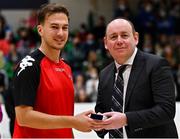 23 January 2022; Referee Urosh Kutijevac is presented with their medal by Basketball Ireland president PJ reidy after the InsureMyHouse.ie U20 Women's National Cup Final match between Portlaoise Panthers, Laois, and Waterford Wildcats, Waterford, at National Basketball Arena in Tallaght, Dublin. Photo by Brendan Moran/Sportsfile