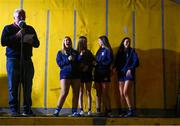 22 January 2022; Rachel Daly, left, Bonnie Wiley-Murphy, Susan Daly and Allison McGee, right, are introduced by MC Leo Doyle, of Scarriff Bay Community Radio, as members of the Scarriff Ogonnelloe Camogie team, who won the Munster Senior Camogie Final, return to Scarriff in Clare. Photo by Ray McManus/Sportsfile