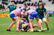 23 January 2022; Conor Oliver of Connacht is tackled by Mathieu de Giovanni, left, and Ngani Laumape of Stade Francais Paris during the Heineken Champions Cup Pool A match between Stade Francais Paris and Connacht at Stade Jean Bouin in Paris, France. Photo by Seb Daly/Sportsfile