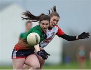 23 January 2022; Emma Cody of Mullinahone in action against Ellen Muldoon of St Brendan's during the 2021 currentaccount.ie All-Ireland Ladies Junior Club Football Championship Semi-Final match between Mullinahone, Tipperary and St Brendan's, Galway at John Lockes GAA Club in Callan, Kilkenny. Photo by Michael P Ryan/Sportsfile