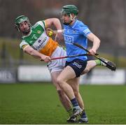 23 January 2022; James Madden of Dublin in action against Ban Conneely of Offaly during the Walsh Cup Group A match between Offaly and Dublin at St Brendan's Park in Birr, Offaly. Photo by Matt Browne/Sportsfile