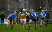 23 January 2022; Conor Molloy of Offaly in action against Sean Moran and Fergal Whitely of Dublin during the Walsh Cup Group A match between Offaly and Dublin at St Brendan's Park in Birr, Offaly. Photo by Matt Browne/Sportsfile