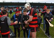 23 January 2022; Dessie Hutchinson of Ballygunner signs autographs after his side's victory in the AIB GAA Hurling All-Ireland Senior Club Championship Semi-Final match between Ballygunner, Waterford, and Slaughtneil, Derry, at Parnell Park in Dublin. Photo by Harry Murphy/Sportsfile