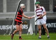 23 January 2022; Dessie Hutchinson of Ballygunner and Paul McNeil of Slaughtneil  shake hands after the AIB GAA Hurling All-Ireland Senior Club Championship Semi-Final match between Ballygunner, Waterford, and Slaughtneil, Derry, at Parnell Park in Dublin. Photo by Harry Murphy/Sportsfile