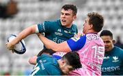 23 January 2022; Tom Farrell of Connacht is tackled by JJ van der Mescht of Stade Francais Paris during the Heineken Champions Cup Pool A match between Stade Francais Paris and Connacht at Stade Jean Bouin in Paris, France. Photo by Seb Daly/Sportsfile