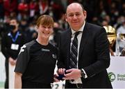 23 January 2022; Referee Emma Perry is presented with her medal by Basketball Ireland president PJ Reidy after the InsureMyHouse.ie Women’s Division One National Cup Final match between Griffith College Templeogue, Dublin, and NUIG Mystics, Galway, at National Basketball Arena in Tallaght, Dublin. Photo by Brendan Moran/Sportsfile