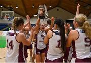 23 January 2022; Meadhbh O'Brien of NUIG Mystics and her teammates celebrate with the cup  after the InsureMyHouse.ie Women’s Division One National Cup Final match between Griffith College Templeogue, Dublin, and NUIG Mystics, Galway, at National Basketball Arena in Tallaght, Dublin. Photo by Brendan Moran/Sportsfile