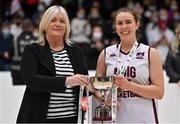 23 January 2022; NUIG Mystics captain Aoife Ryan is presented with the cup by Basketball Ireland WNLC chairperson Breda Dick after the InsureMyHouse.ie Women’s Division One National Cup Final match between Griffith College Templeogue, Dublin, and NUIG Mystics, Galway, at National Basketball Arena in Tallaght, Dublin. Photo by Brendan Moran/Sportsfile