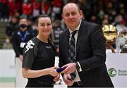 23 January 2022; Referee Emer Buckley is presented with her medal by Basketball Ireland president PJ Reidy after the InsureMyHouse.ie Women’s Division One National Cup Final match between Griffith College Templeogue, Dublin, and NUIG Mystics, Galway, at National Basketball Arena in Tallaght, Dublin. Photo by Brendan Moran/Sportsfile