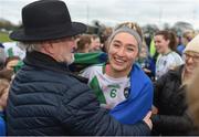 23 January 2022; St Sylvester's captain Danielle Lawless celebrates with her grandad Ciaron Magennis after the 2021 currentaccount.ie All-Ireland Ladies Intermediate Club Football Championship Semi-Final match between St Sylvester's, Dublin and Kinawley Brian Boru's, Fermanagh at St Sylvester's GAA Club in Dublin. Photo by Daire Brennan/Sportsfile