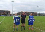 23 January 2022; Referee Declan Carolan with St Sylvester's captain Danielle Lawless and Kinawley Brian Boru's captain Joanne Doonan pay their respects to Ashling Murphy ahead of the 2021 currentaccount.ie All-Ireland Ladies Intermediate Club Football Championship Semi-Final match between St Sylvester's, Dublin and Kinawley Brian Boru's, Fermanagh at St Sylvester's GAA Club in Dublin. Photo by Daire Brennan/Sportsfile