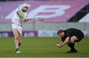 23 January 2022; Referee Rory McGann ducks as Joseph Cuddihy of Ballyhale Shamrocks shoots at goal during the AIB GAA Hurling All-Ireland Senior Club Championship Semi-Final match between St Thomas, Galway and Ballyhale Shamrocks, Kilkenny at Semple Stadium in Thurles, Tipperary. Photo by Ramsey Cardy/Sportsfile