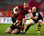 23 January 2022; Mike Haley of Munster is tackled by Brad Shields, left, and Dan Robson of Wasps during the Heineken Champions Cup Pool B match between Munster and Wasps at Thomond Park in Limerick. Photo by Sam Barnes/Sportsfile