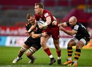 23 January 2022; Mike Haley of Munster is tackled by Brad Shields, left, and Dan Robson of Wasps during the Heineken Champions Cup Pool B match between Munster and Wasps at Thomond Park in Limerick. Photo by Sam Barnes/Sportsfile