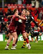 23 January 2022; Rory Scannell of Munster, left, celebrates with teammate Craig Casey after scoring their side's sixth try during the Heineken Champions Cup Pool B match between Munster and Wasps at Thomond Park in Limerick. Photo by Sam Barnes/Sportsfile
