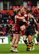 23 January 2022; Rory Scannell of Munster, left, celebrates with teammate Craig Casey after scoring their side's sixth try during the Heineken Champions Cup Pool B match between Munster and Wasps at Thomond Park in Limerick. Photo by Sam Barnes/Sportsfile