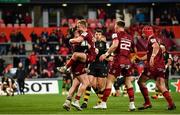 23 January 2022; Rory Scannell of Munster, left, celebrates with teammates, including Craig Casey, second from left, after scoring their side's sixth try during the Heineken Champions Cup Pool B match between Munster and Wasps at Thomond Park in Limerick. Photo by Sam Barnes/Sportsfile